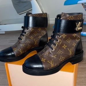 Brown designer combat boots.